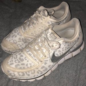 White cheetah Nike running shoes